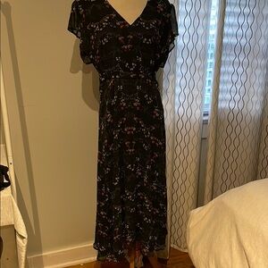 Floral Black Dress in perfect condition and looks super cute on.